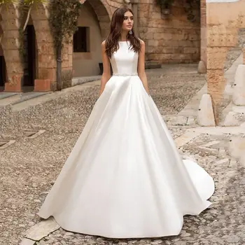 Изготовленное на заказ атласное свадебное платье A-Line 2023 Стильный SCOOP Аппликации без рукавов Часовня Поезд Свадебное платье Vestidos Novias De Saten